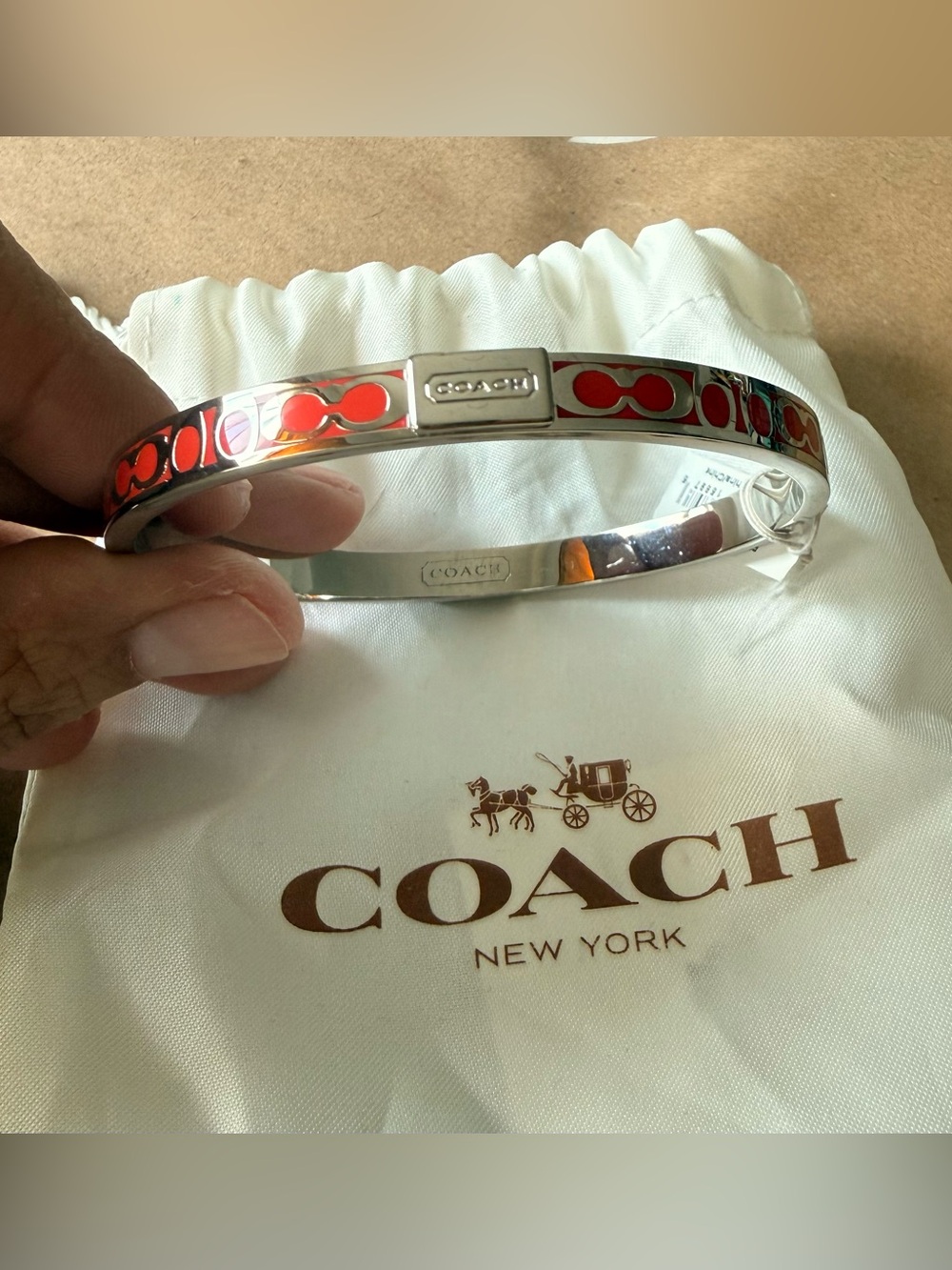 COACH Women's Red and Silver Tone Bangle Bracelet with Iconic C logo